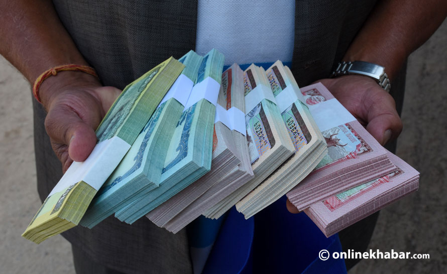 Nepal banks begin supplying clean Rs 100 notes through ATMs for Dashain